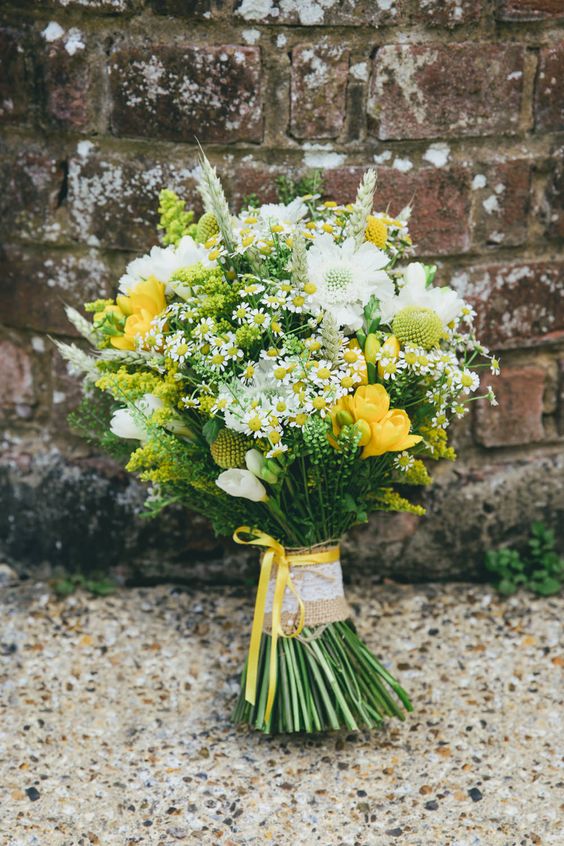white and yellow flower and greenery bridal bouquet for yellow weddding themes for 2023 yellow and green
