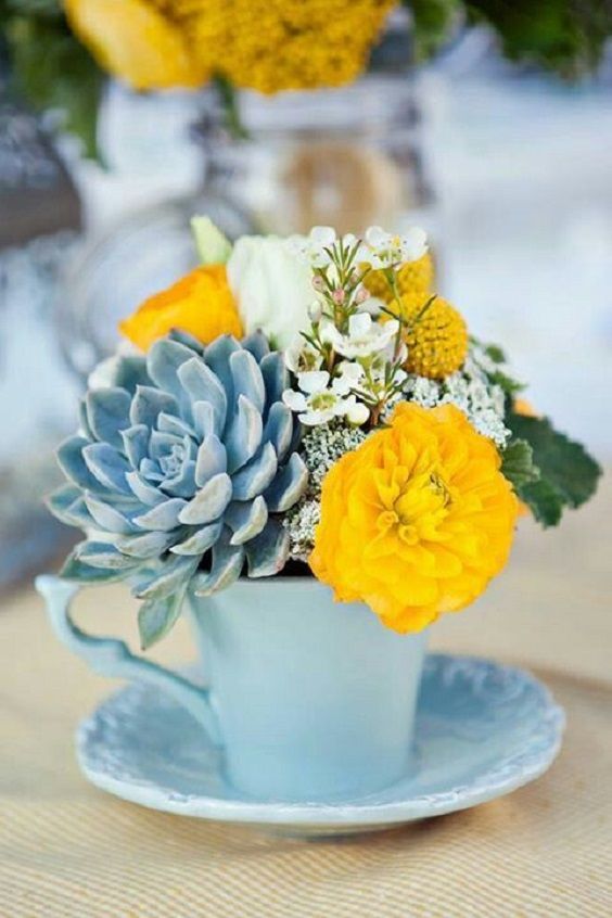yellow and dusty blue flower wedding centerpieces for yellow weddding themes for 2023 yellow and dusty blue