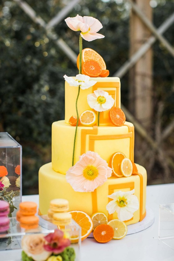 citrus three tier yellow wedding cake for yellow weddding themes for 2023 yellow orange and pink