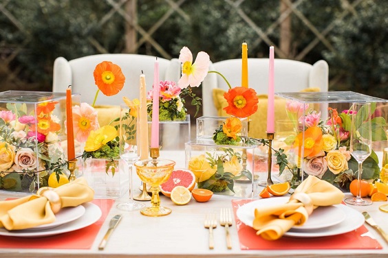 orange and yellow flower pink candles citrus yellow napkin wedding table setting for yellow weddding themes for 2023 yellow orange and pink