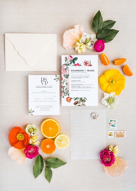 wedding invitation suite decorated citrus orange yellow and pink flowers for yellow weddding themes for 2023 yellow orange and pink