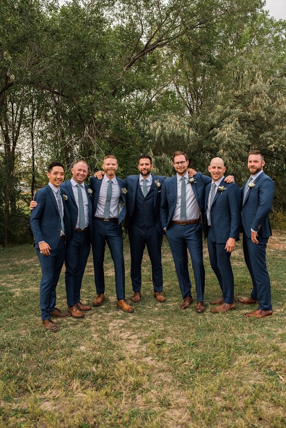 navy blue groomsmen suits dusty blue ties for navy blue wedding themes for 2023 navy blue and dusty blue