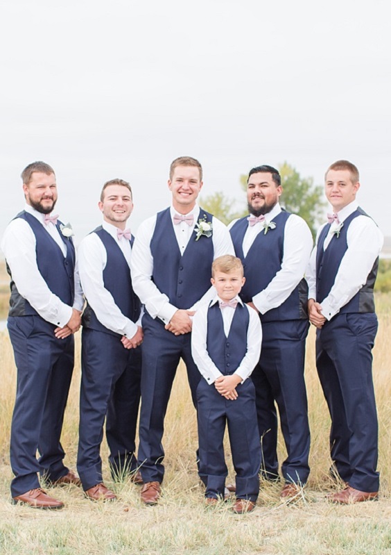 navy blue men suits and dusty rose bowties for navy blue wedding themes for 2023 navy blue and dusty rose