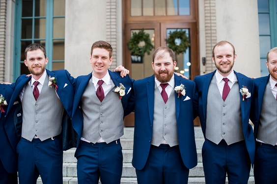 navy blue groomsmen suits and burgundy ties for dusty blue wedding themes for 2023 dusty blue and burgundy