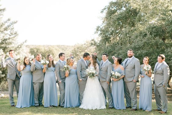 dusty blue bridesmaid dresses white bridal gown grey groomsmen suits dusty blue ties for dusty blue wedding themes for 2023 dusty blue and grey