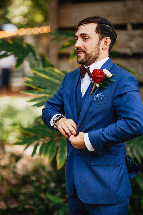 Blue Groom Suit Burgundy Boutonniere for Navy Blue, Gold and Burgundy Wedding Color Palettes 2023