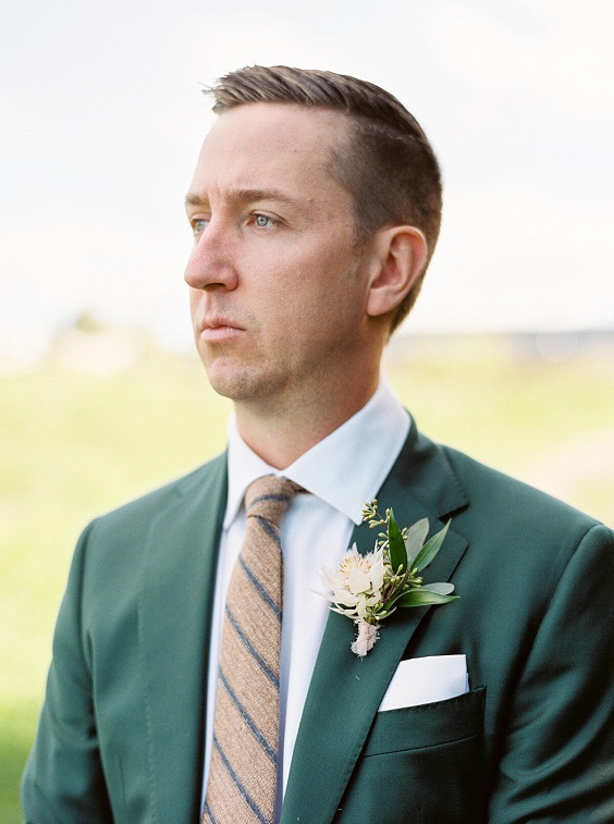 emerald green bridegroom suit for great summer wedding color palettes for 2024 dusty rose and emerald green