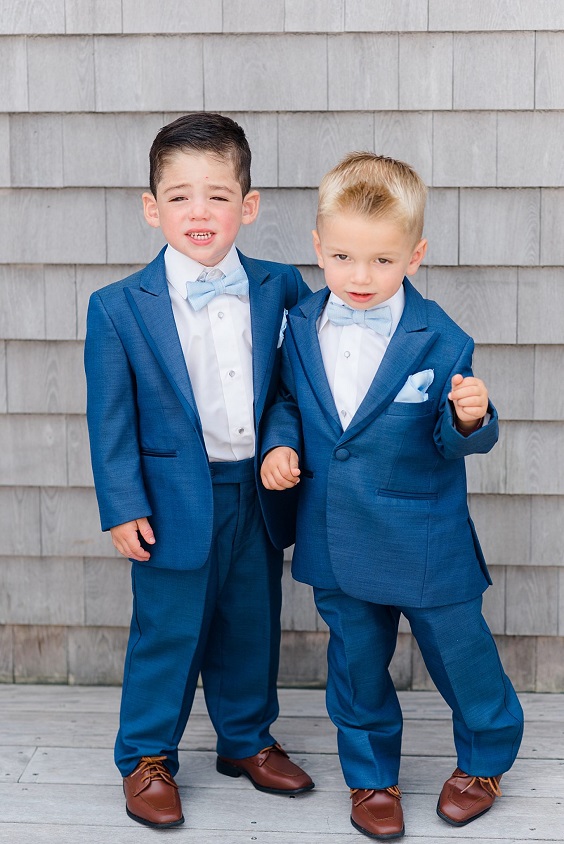 ring bearers navy suits and ice blue bowties for great summer wedding color palettes for 2024 ice blue navy and white