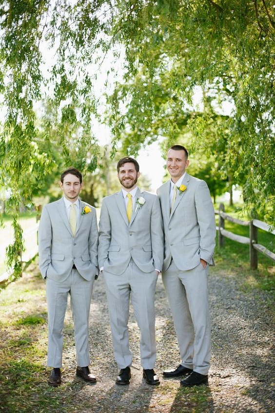 groomsmen grey suits and yellow ties for great summer wedding color palettes for 2024 navy blue and yellow