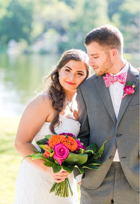 bridegroom pink bowtie and corsage for great summer wedding color palettes for 2024 pink coral and orange