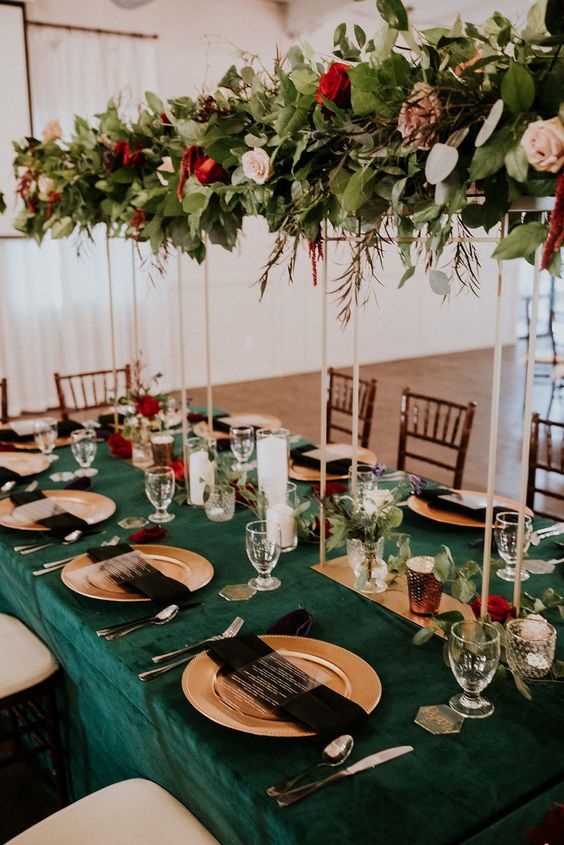 emerald green wedding tablecloth burgundy flower and greenery centerpieces for emerald green wedding color schemes for 2024 emerald green and burgundy