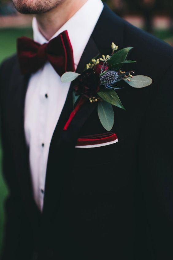 black men's suit with burgundy bow tie for burgundy wedding colors 2023 burgundy and blush