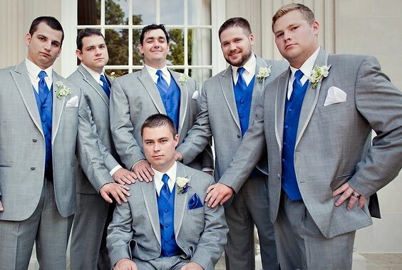 Groom and groomsmen suits for royal blue and silver metallic winter wedding
