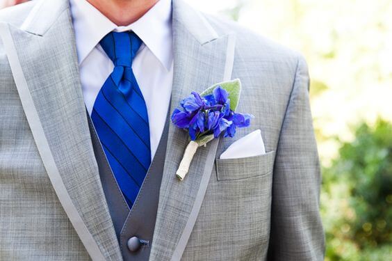 Groom suit for royal blue and silver metallic winter wedding