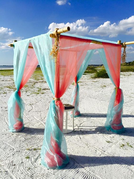 Beach Wedding Ceremony Decorations for Coral and Turquoise Wedding Color Palettes 2024