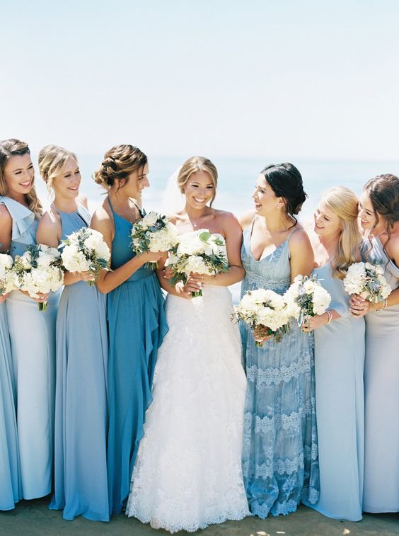 dusty blue ice blue and light blue bridesmaid dresses white bridal gown for destination wedding colors 2024 shades of blue