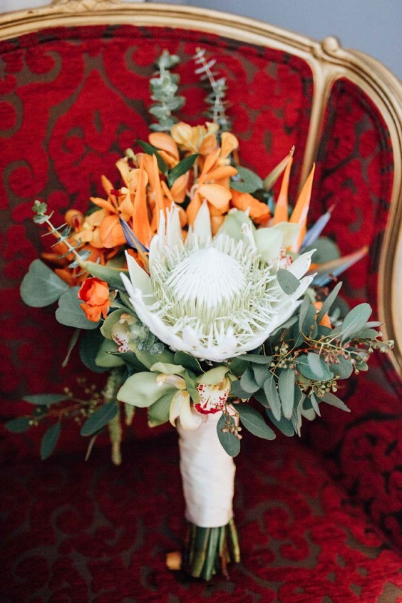 orange and white flower bridal bouquet for royal blue wedding colors 2024 royal blue and orange