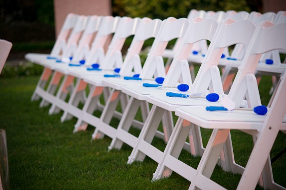 white wedding chairs with royal blue decors for royal blue wedding colors 2024 royal blue and white