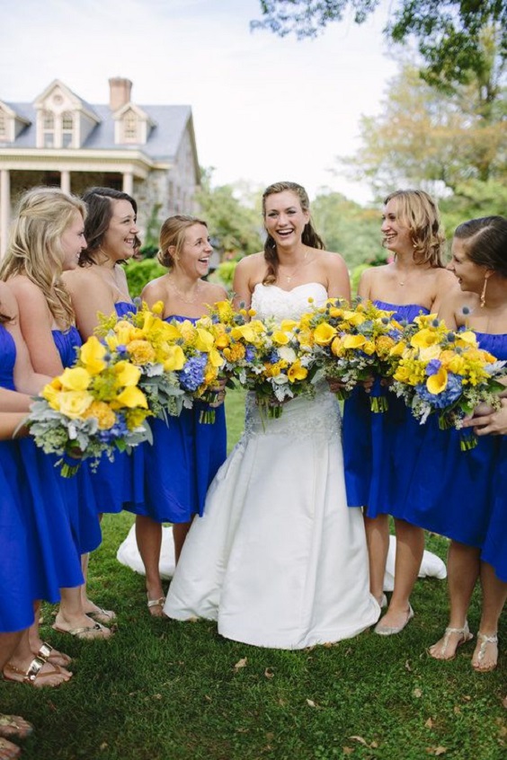 royal blue bridesmaid dresses white bridal gown and white bridal bouquet for royal blue wedding colors 2024 royal blue and yellow