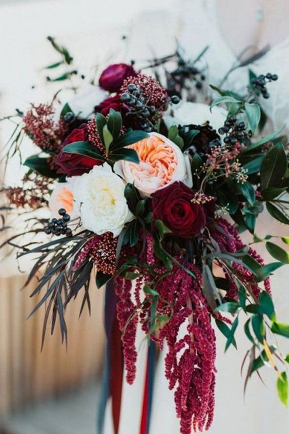 burgundy and navy flower and greenery bridal bouquet for december wedding colors 2024 burgundy navy and green