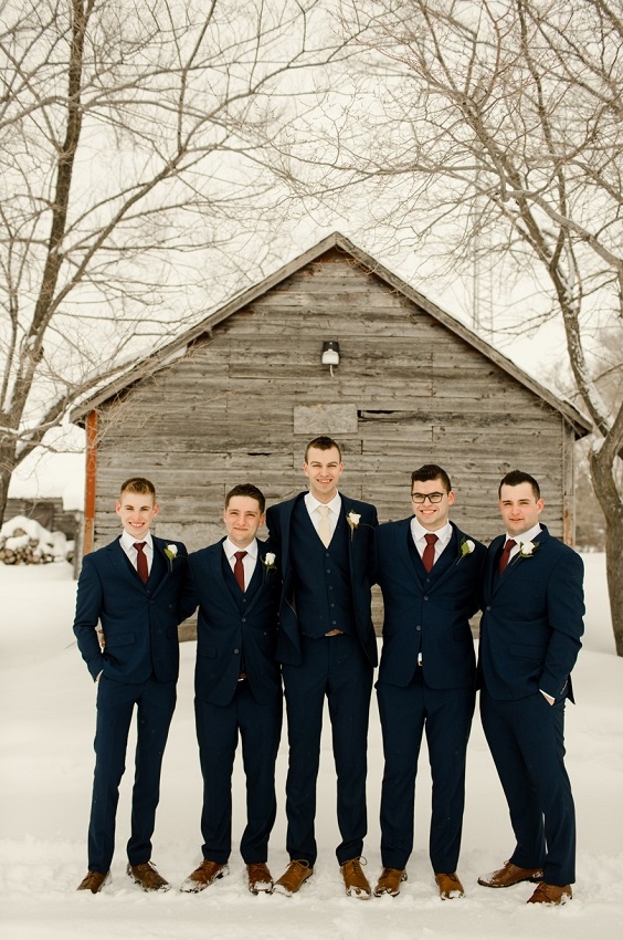 navy blue bridegroom and groomsmen suits burgundy ties for december wedding colors 2024 burgundy navy and green