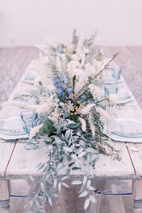 ice blue and white flower wedding table centerpieces for december wedding colors 2024 shades of blue