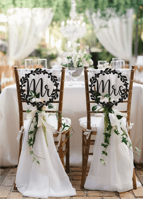 greenery and white sash sweetheart chair decoration for march wedding colors combos for 2024 sage green and whisper white