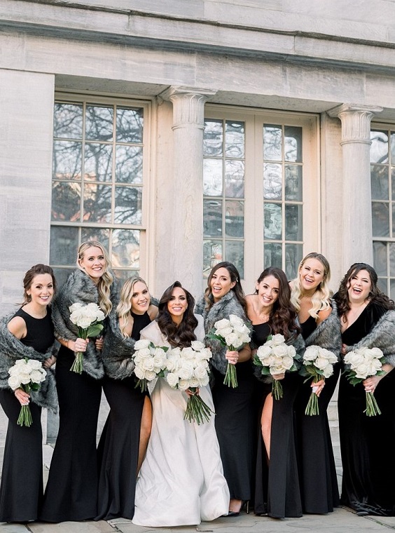 black bridesmaid dresses white bridal gown white flower and greenery bouquet for january wedding colors for 2024 black white and greenery