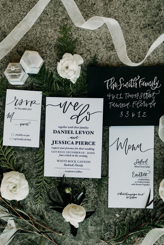 white and black wedding stationery for january wedding colors for 2024 black white and greenery
