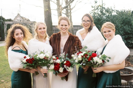 emerald green bridesmaid dresses with white fur white bridal gown with brown fur for january wedding colors for 2024 emerald green and red
