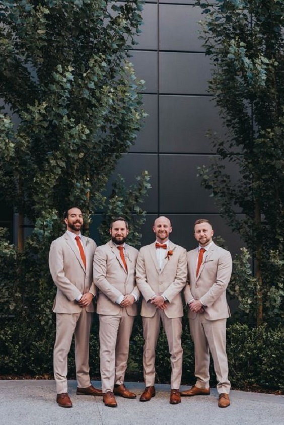tan groomsmen suits and burnt orange ties for burnt orange wedding colors for 2024 burnt orange tan and cream
