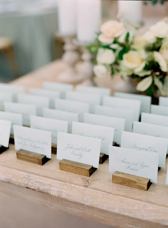 Sea Glass Blue Escort Cards for Sea Glass and Peach June Wedding Color Palettes for 2024