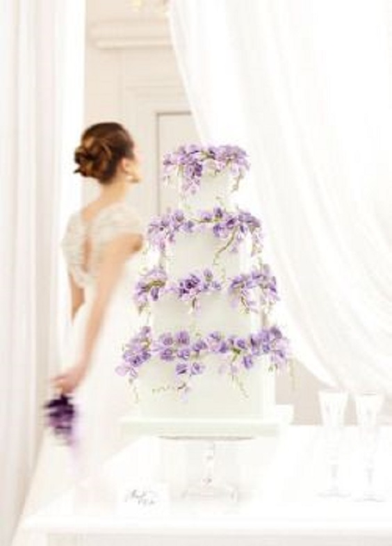 White Cake with Lilac Decorations for Lilac, Lavender and Blush June Wedding Color Palettes for 2024