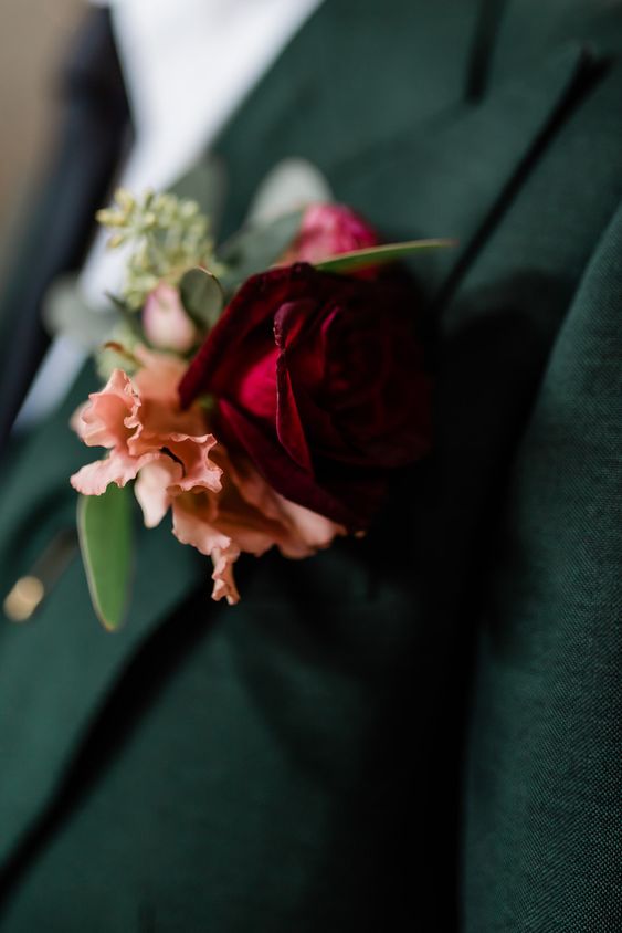 emerald bridegroom suit with burgundy flower boutonnieres for emerald green and gold wedding colors emerald gold and burgundy