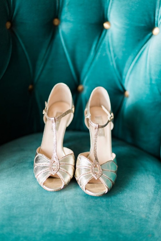 gold bridal shoes on emerald chair for emerald green and gold wedding colors emerald gold and peach