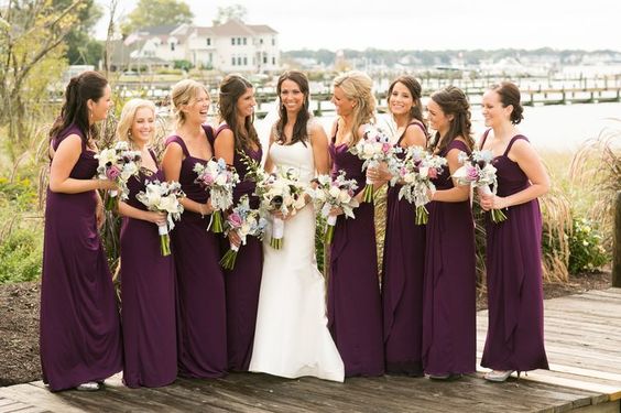 white bridal gown and dark purple bridesmaid dresses for purple wedding colors combos for 2024 dark purple and white
