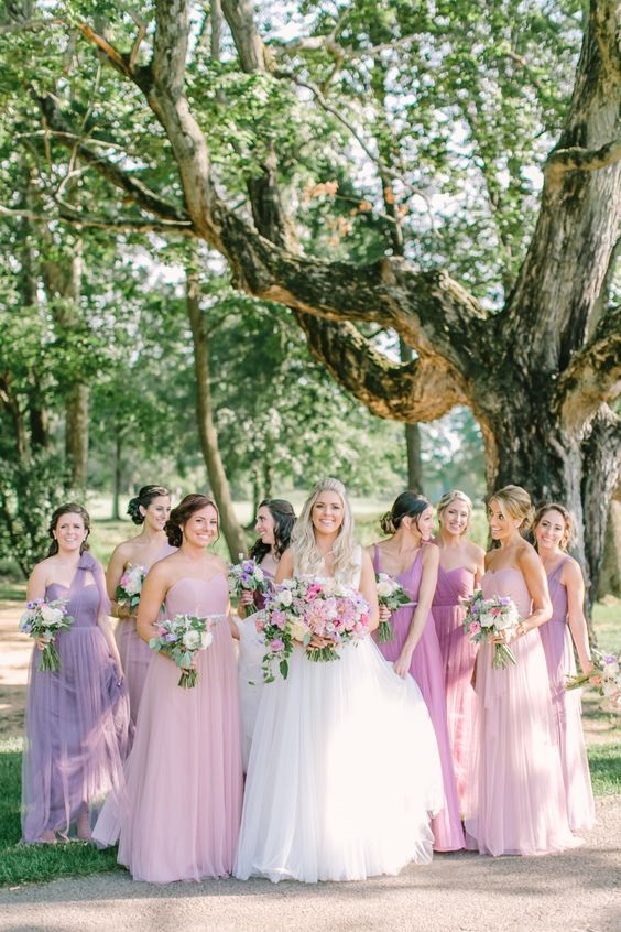 white wedding gowns and chalk violet pink bridesmaid dresses for purple wedding colors combos for 2024 chalk violet and pink