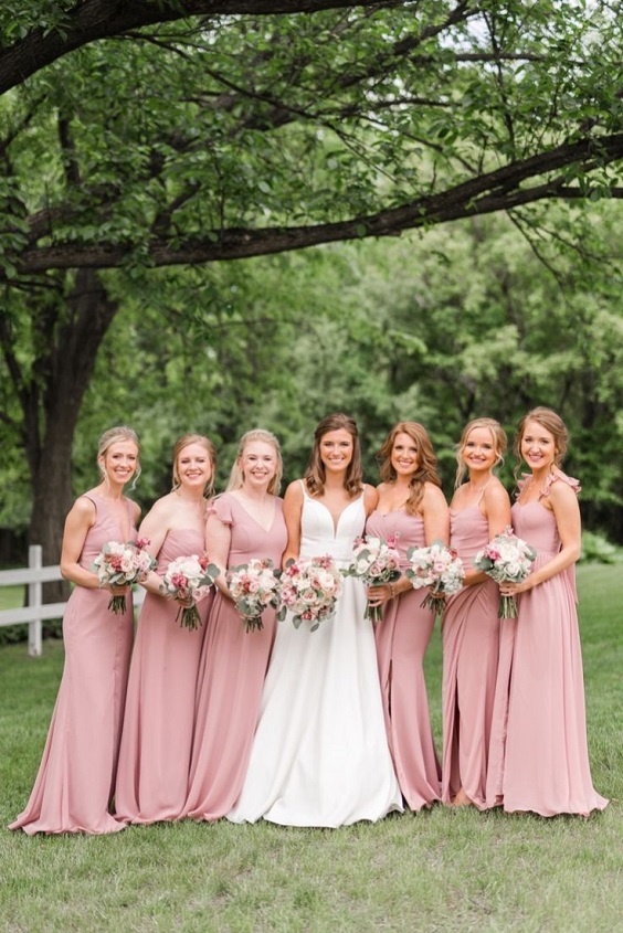 white bridal gown and dusty rose bridesmaid dresses for july wedding colors combos for 2024 dusty rose and white