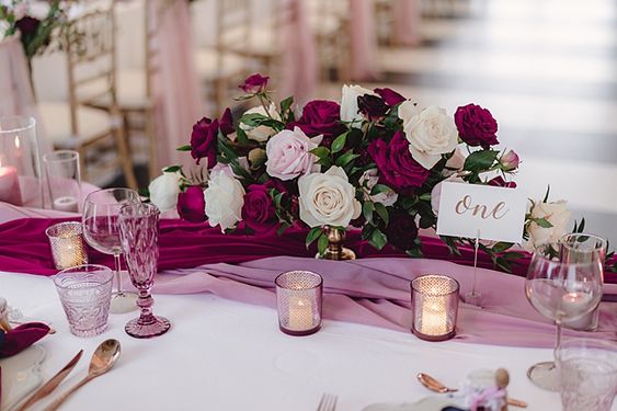burgundy and pastel lilac wedding centerpiece for july wedding colors combos for 2024 burgundy and ivory