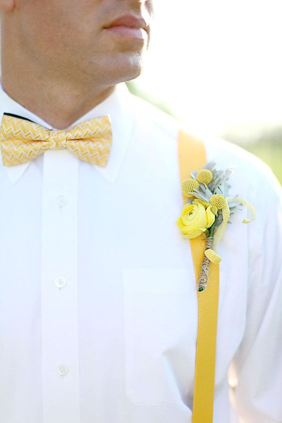 white groom attire with pastel yellow flower decoration for july wedding colors combos for 2024 pastel yellow and ivory