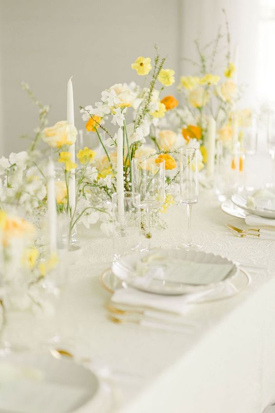white tableware with yellow centerpiece for july wedding colors combos for 2024 pastel yellow and ivory