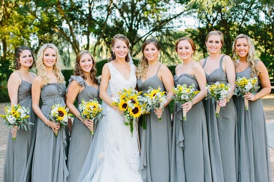 b2683 dusty blue bridesmaid dresses white bridal gown sunflower bouquets for country wedding colors for 2025 dusty blue and sunflower