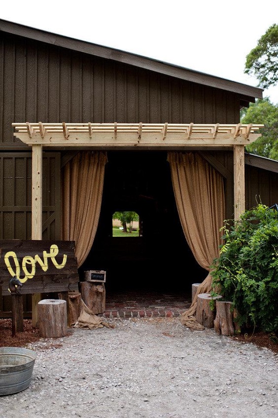 wooden wedding ceremony house with yellow love letters for country wedding colors for 2025 yellow and white