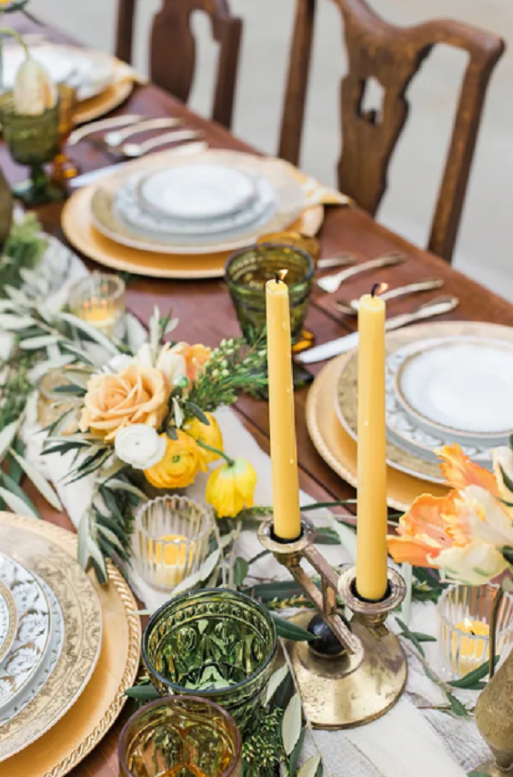 yellow candles and yellow flowers at wedding table for sage green wedding colors combos for 2025 sage green and yellow iris