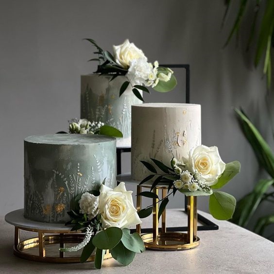 sage green and white wedding cake with white flowers for sage green wedding colors combos for 2025 sage green and grey