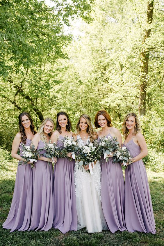 lavender bridesmaid dresses white bridal gown for rustic themed wedding colors for 2025 lavener white and greenery