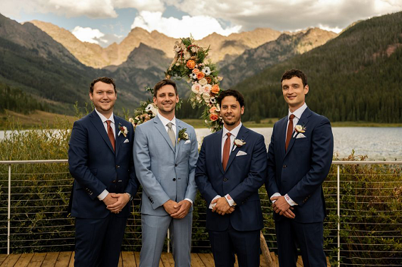 blue groomsmen suits with terracotta ties for rustic themed wedding colors for 2025 terracotta and orange