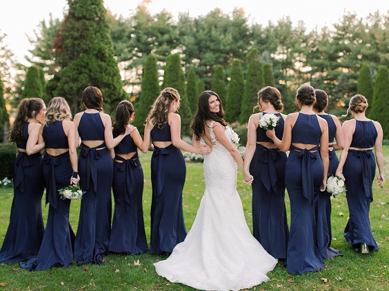 navy blue bridesmaid dresses and white bridal gown for navy blue wedding colors for 2025 navy blue white and gold