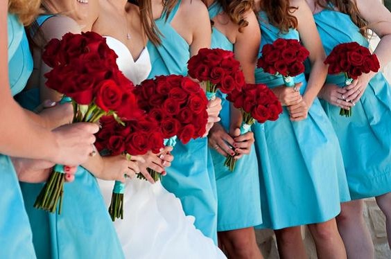 turquoise bridesmaid dresses and a white bridal gown for blue wedding colors combos for 2025 turquoise and red