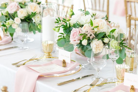 wedding table with pink table napkin and pink flowers for june wedding colors combos for 2025 light pink and pink
